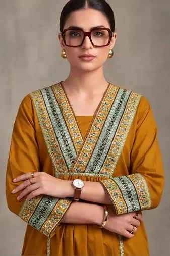 women embroidered empire thread work cotton kurta with trousers & dupatta
