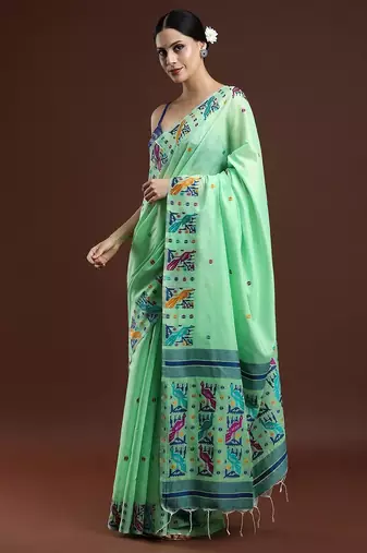 green woven design zari muga saree