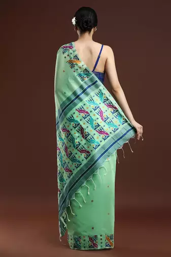 green woven design zari muga saree