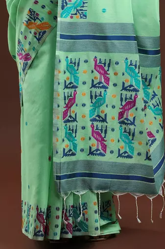 green woven design zari muga saree