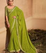 green embroidered leheriya saree