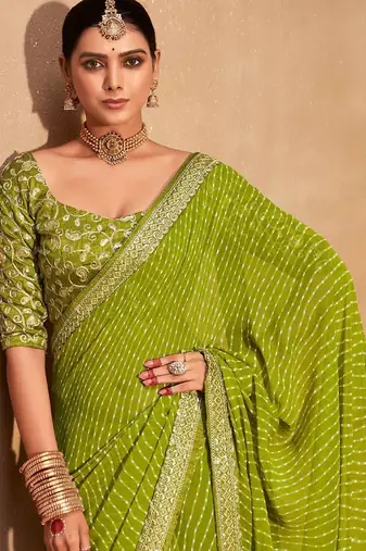 green embroidered leheriya saree