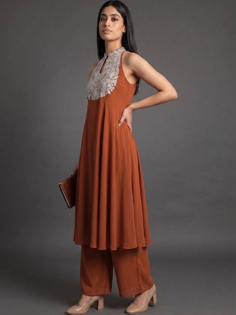 women ethnic motifs embroidered panelled thread work silk georgette kurta with palazzos