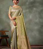 green woven design zari silk blend banarasi saree