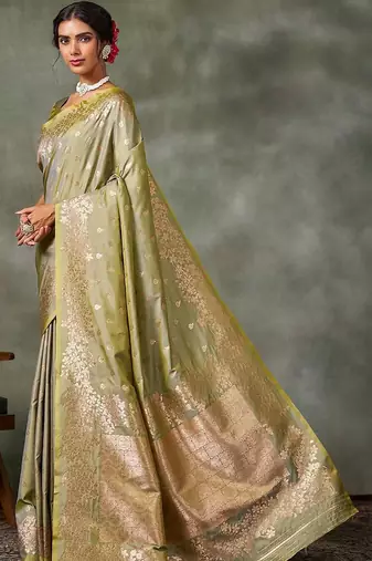 green woven design zari silk blend banarasi saree