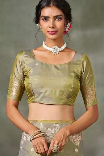 green woven design zari silk blend banarasi saree