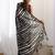 black striped sequinned saree with unstitched blouse piece
