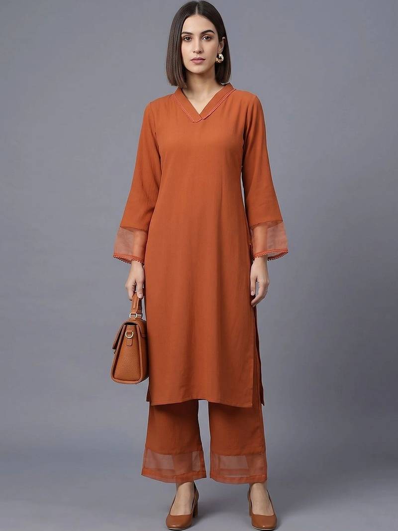 women regular silk crepe kurta with palazzos