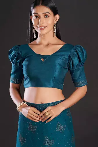 teal teal & gold-toned embellished satin saree