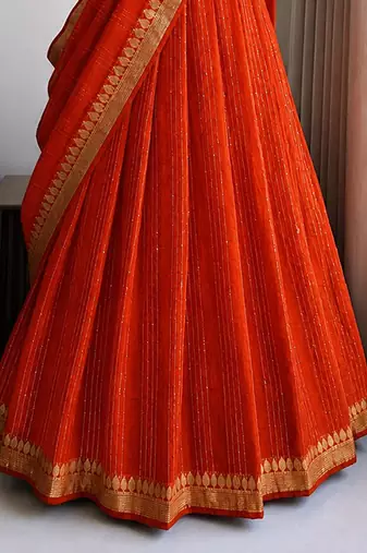 Orange Viscose Georgette Zari Weaving Border With all over Lining with Sequence Lehenga Choli with Dupatta