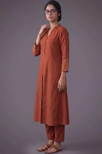 women embroidered regular thread work kurta with trousers