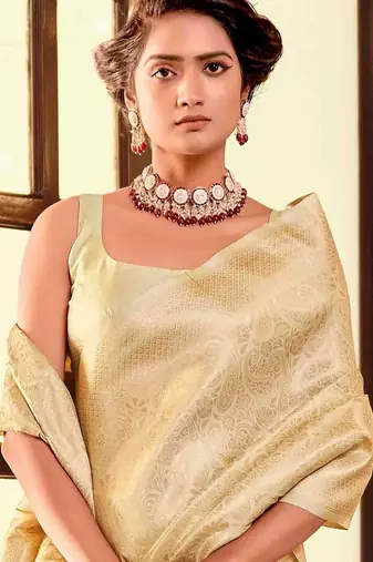 cream woven design zari kanjeevaram saree