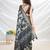 black floral printed tussar saree with blouse piece