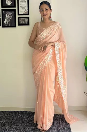 peach sequinned poly georgette saree  with blouse piece