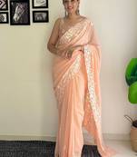 peach sequinned poly georgette saree  with blouse piece