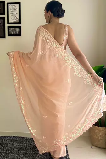 peach sequinned poly georgette saree  with blouse piece