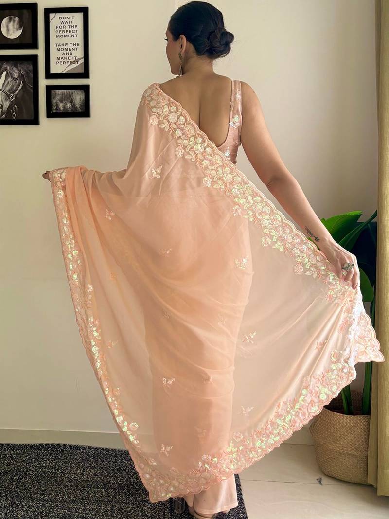 peach sequinned poly georgette saree  with blouse piece