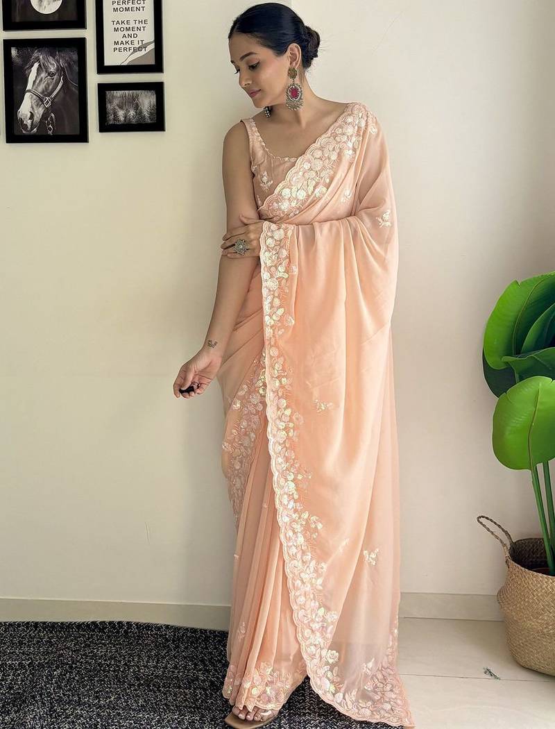 peach sequinned poly georgette saree  with blouse piece