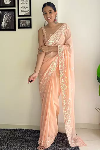 peach sequinned poly georgette saree  with blouse piece
