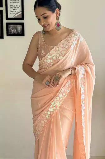 peach sequinned poly georgette saree  with blouse piece
