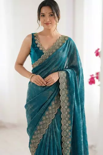 teal embellished zari silk blend saree
