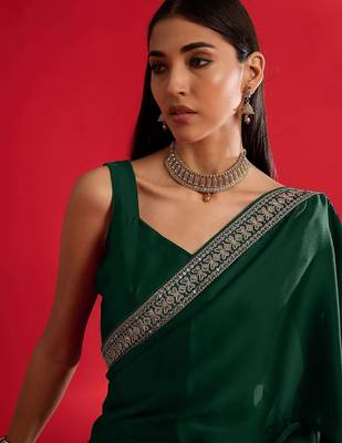 green embroidered satin saree 5