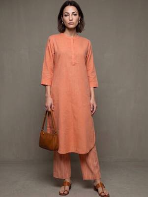 women regular cotton kurta with trousers 1