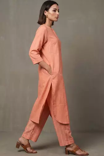 women regular cotton kurta with trousers