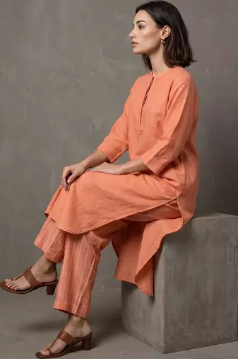 women regular cotton kurta with trousers