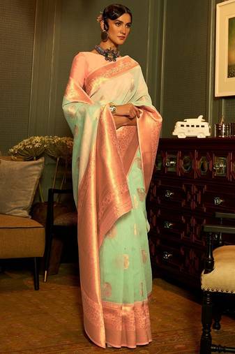 sea_green sea green peach coloured woven design zari poly linen banarasi saree
