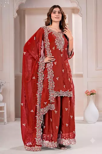 Women embroidered orange kurta with palazzo & dupatta set
