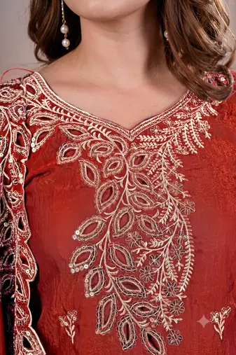 Women embroidered orange kurta with palazzo & dupatta set