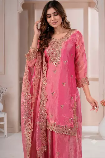 Women embroidered rani pink kurta with palazzo & dupatta set