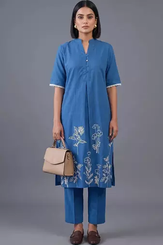 women floral embroidered regular thread work kurta with trousers