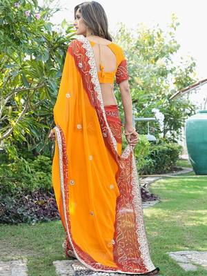 orange bandhani zari poly georgette heavy work bandhani saree 2