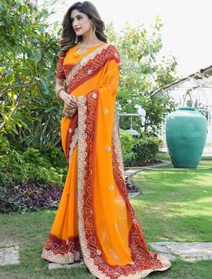 orange bandhani zari poly georgette heavy work bandhani saree 3