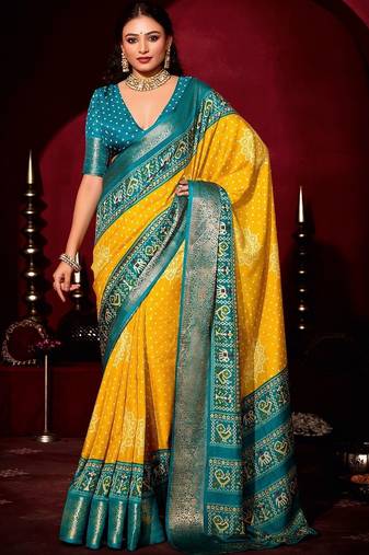 yellow ethnic motifs zari silk blend patola saree