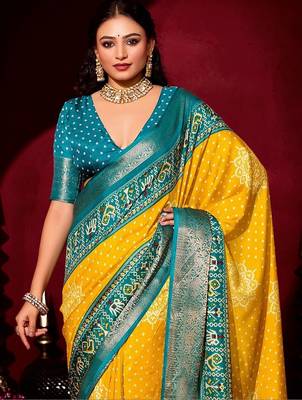 yellow ethnic motifs zari silk blend patola saree 4