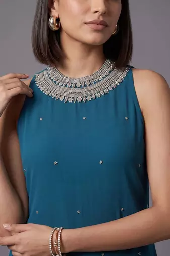 women ethnic motifs regular beads and stones kurta with trousers