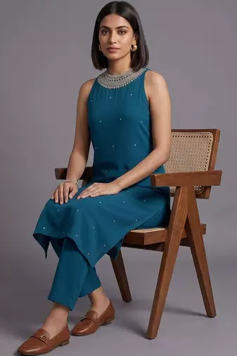 women ethnic motifs regular beads and stones kurta with trousers