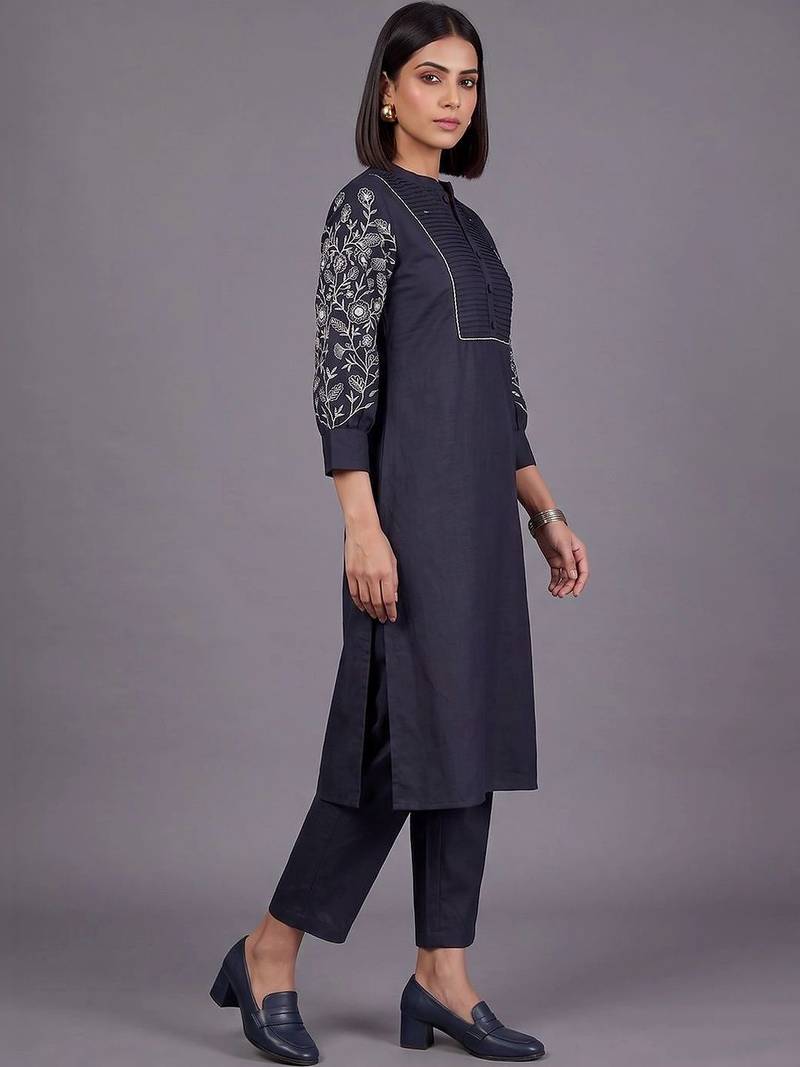 women floral embroidered regular thread work kurta with trousers