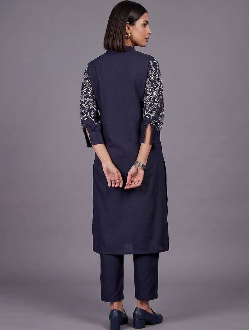 women floral embroidered regular thread work kurta with trousers
