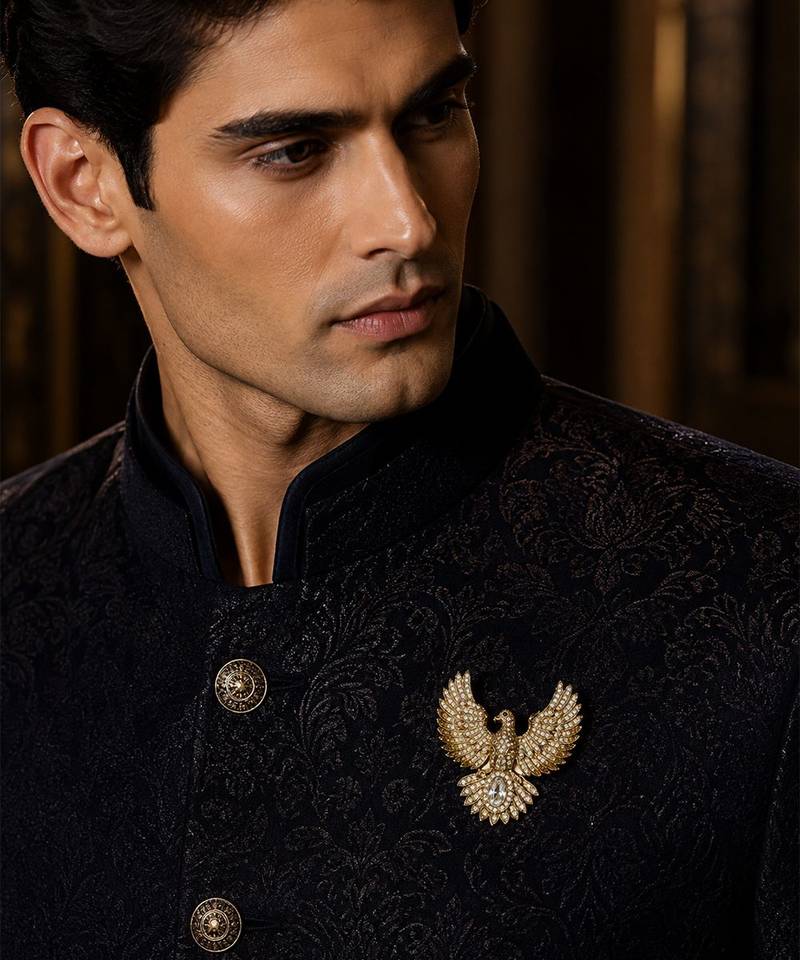 Gold plated zircon bird motif brooch