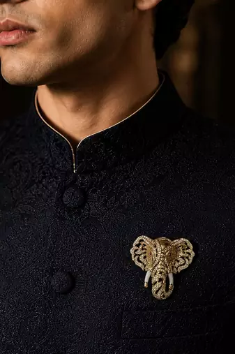Gold plated zircon elephant motif brooch