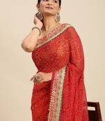 Yellow yellow & red bandhani beads and stones half and half bandhani saree