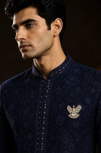 Gold plated white stone peacock motif brooch