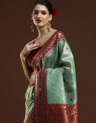 green woven design zari banarasi saree 3