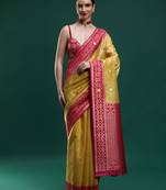 yellow ethnic motif woven design zari banarasi saree
