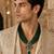 Gold plated multi layered green beaded pendant necklace