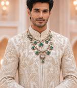 Double layered green stone kundan statement necklace